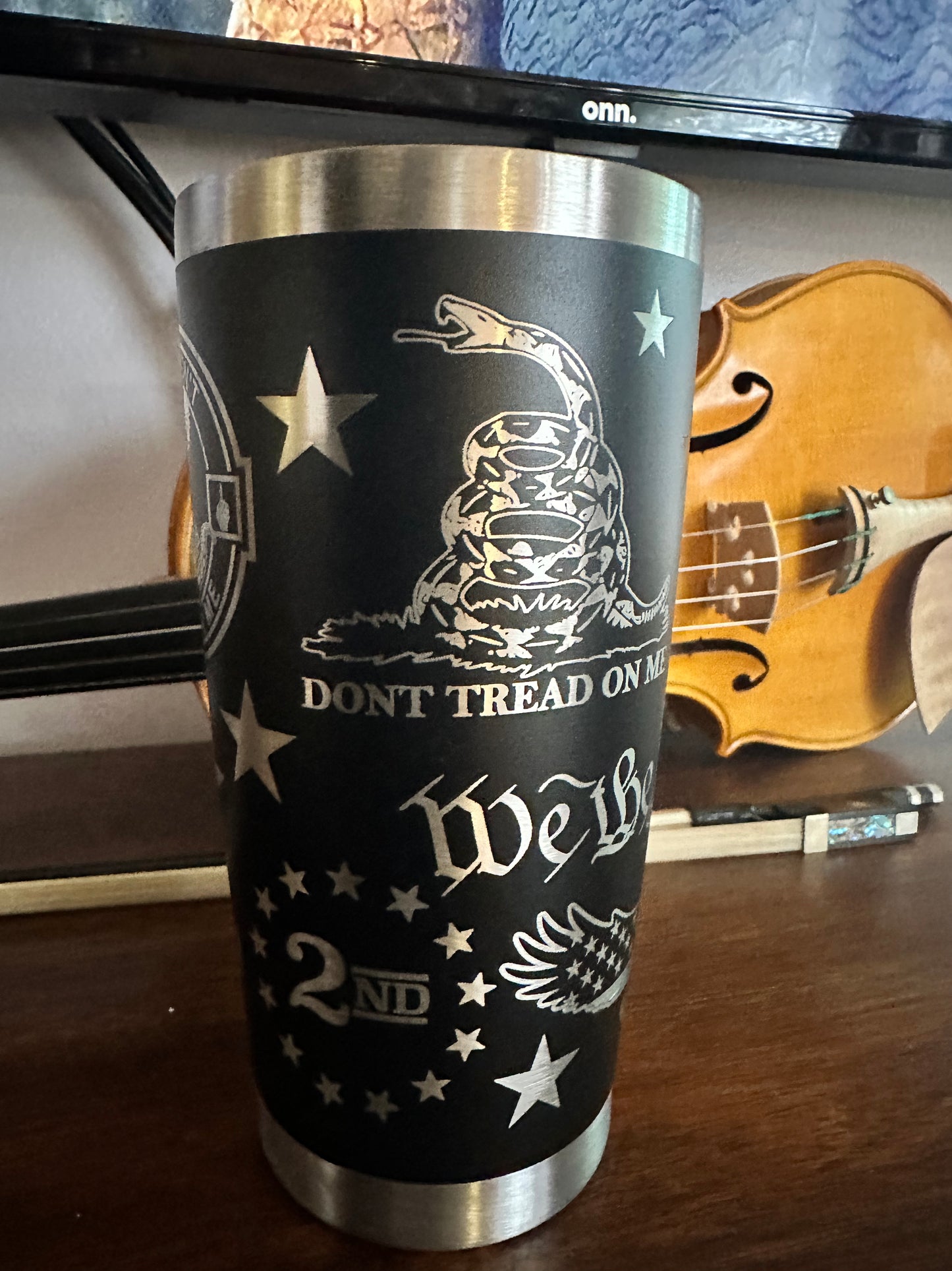 Laser engraved 20oz stainless steel “We The people” tumbler with lid.